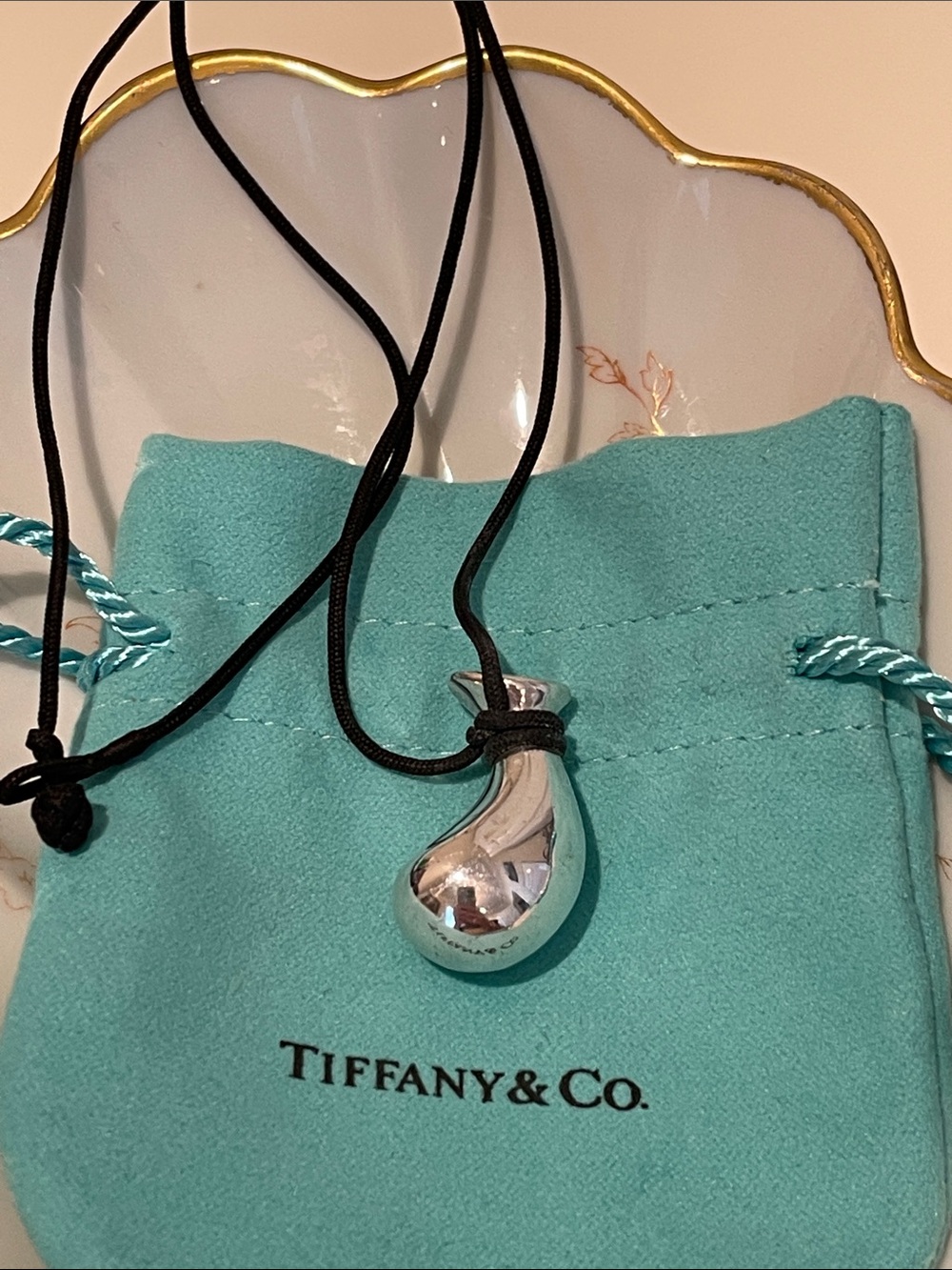 Tiffany & Co. Elsa Peretti Polished Silver Bean Pendant on Black Cord